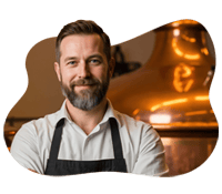 Smiling brewery owner with a POS system.