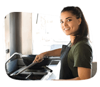 Woman using DBS POS system at a food truck.