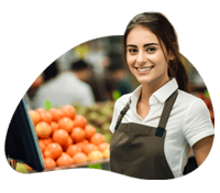 Smiling female cashier using Dbs4pos POS system at grocery store.